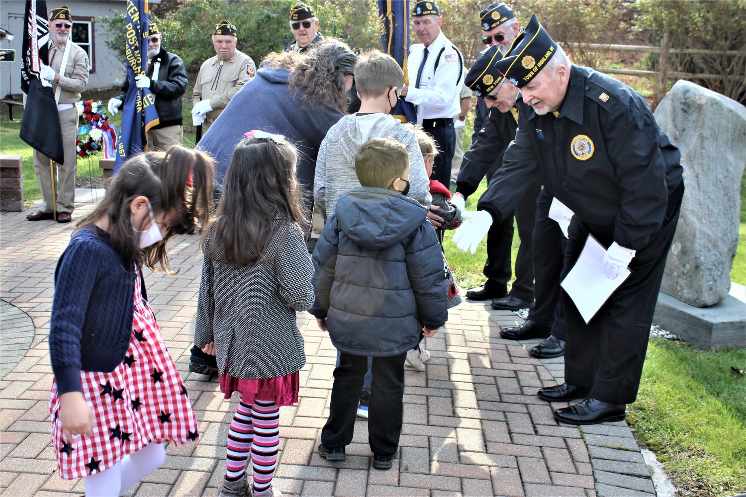 Students from the Eldred preschool class greet the veterans and thank them for their service.